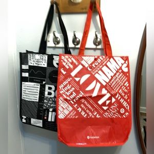 Two Lululemon large red and black tote bags 16” x 14”.  ❤️🥰🌹